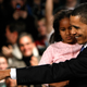 Democratic presidential candidate Sen. Barack Obama (D-IL) holds his youngest daughter Sasha while thanking supporters for his victory in the Iowa caucus January 3, 2008 in Des Moines, Iowa
